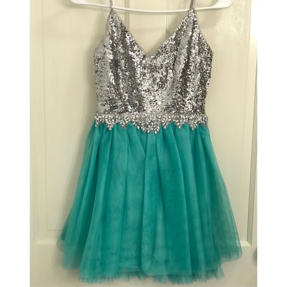 Women’s teal formal dress.